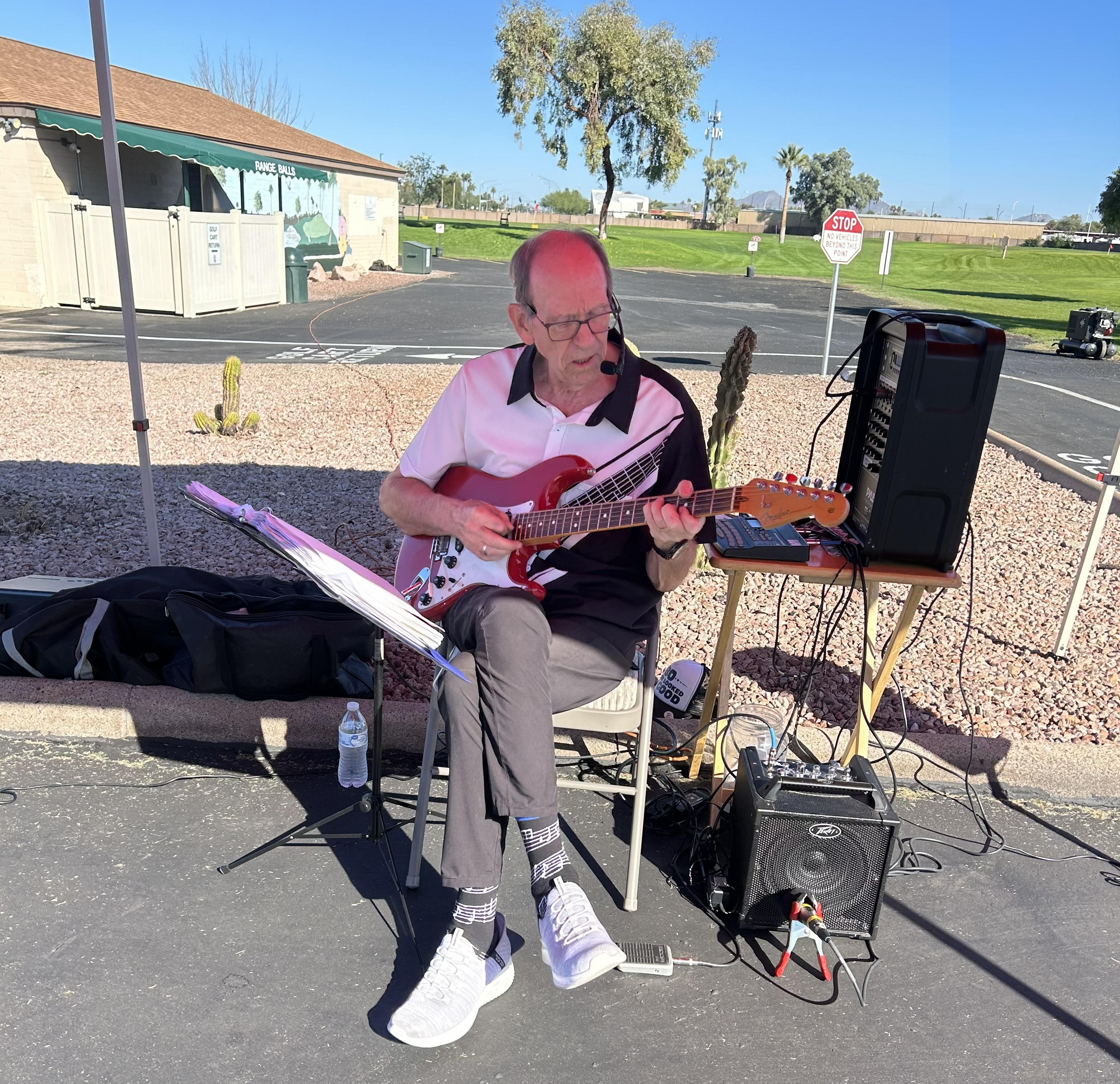  This talented guitarist provided music for the duration of the cart wash, lending a festive atmosphere to the event..
