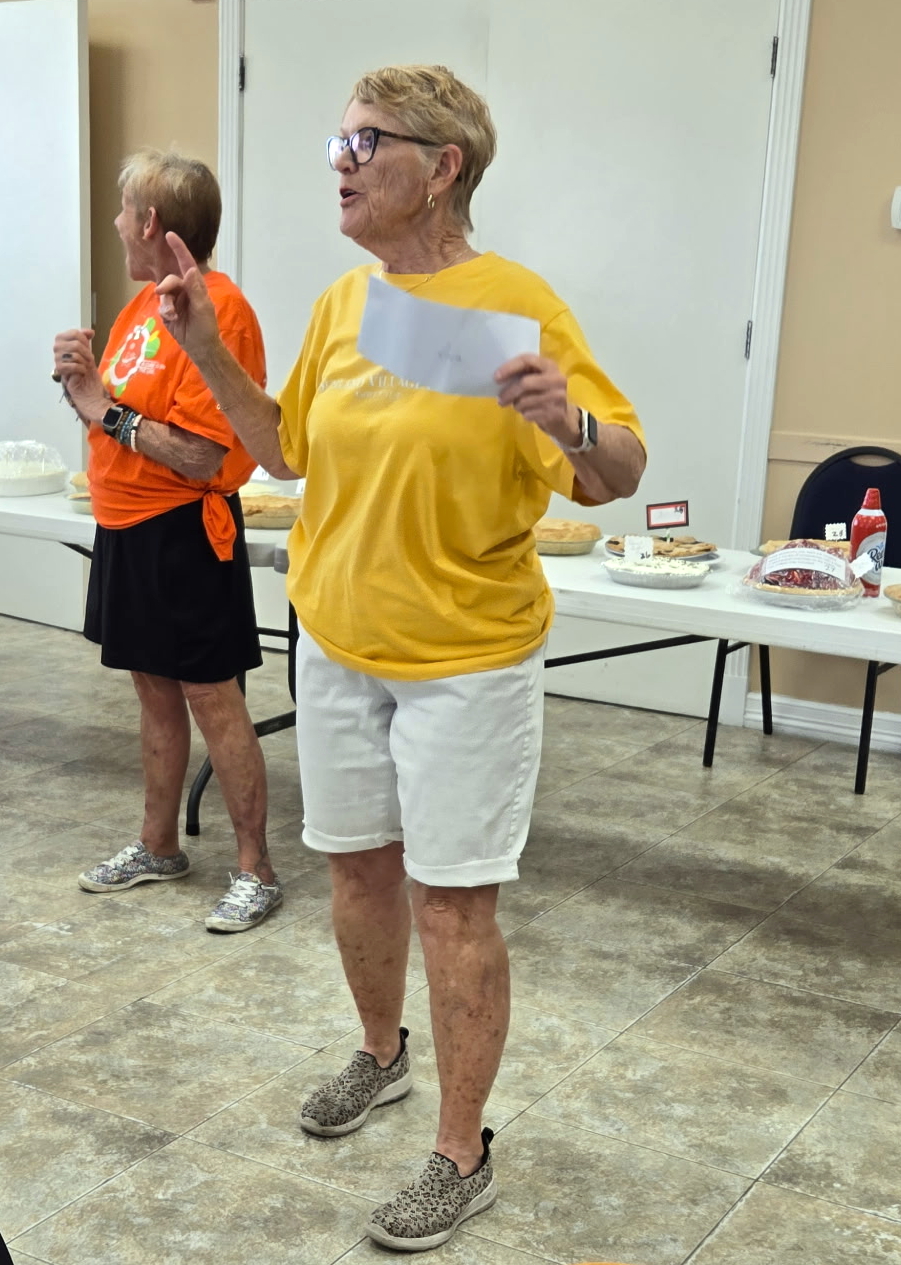 Lona Christoffers presents $500.00 check to the National Multiple Sclerosis Society.