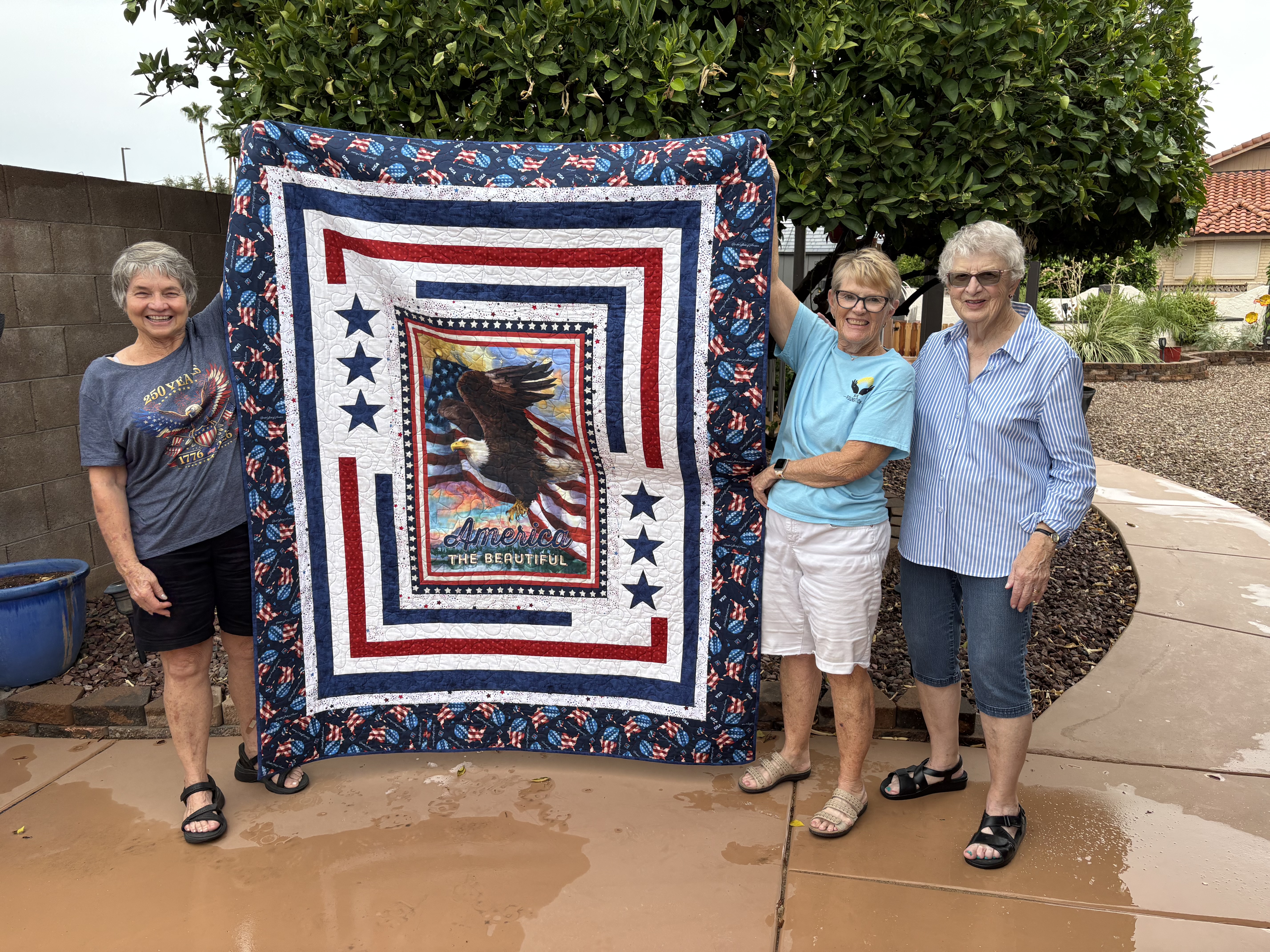 Picture of Quilt and Raffle Winner